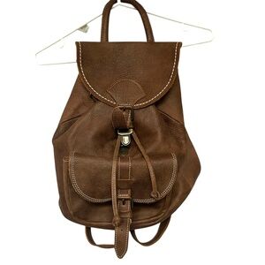 Roots Backpack Pebbled Leather Brown Drawstring Flap Front pocket